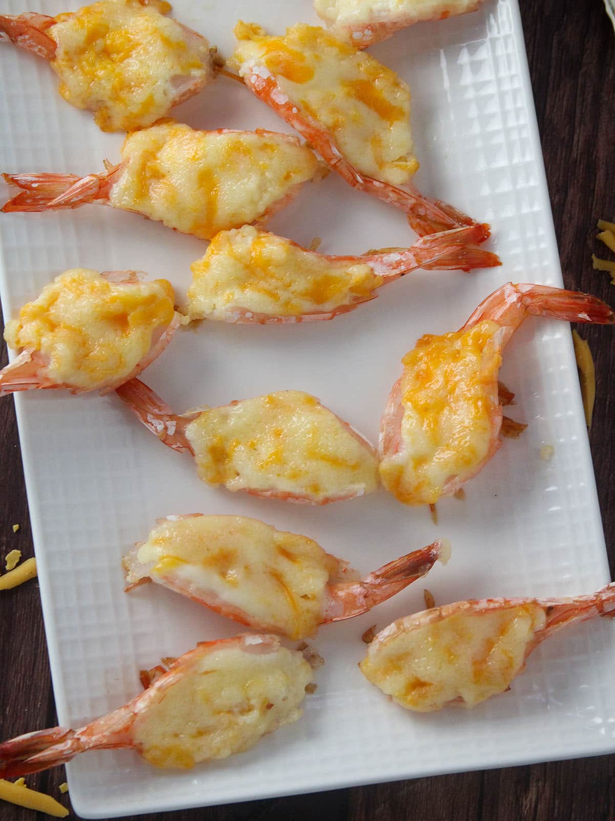 Baked Cheese Shrimp on a white serving platter