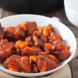 Spare Ribs with Ketchup and Pineapple in a white serving bowl