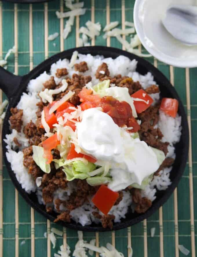 Japanese taco rice in a cast-iron skillet