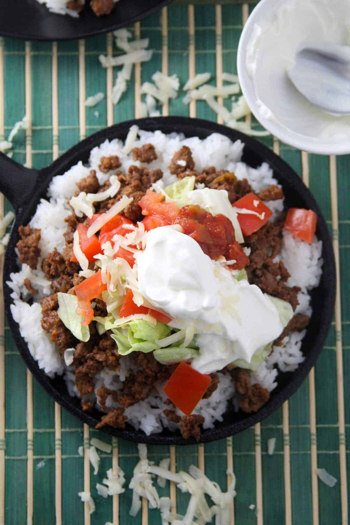 Japanese taco rice in a cast-iron skillet