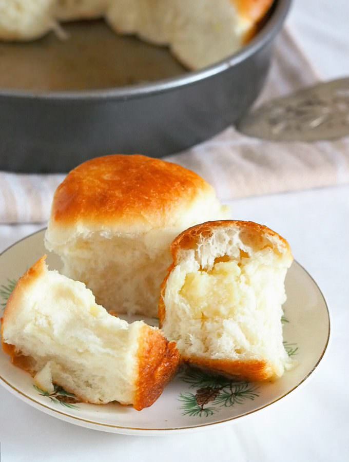 Yema Bread Rolls with soft, fluffy bread and creamy yema filling are the ultimate snacks. Enjoy for breakfast or anytime you need a sweet treat!