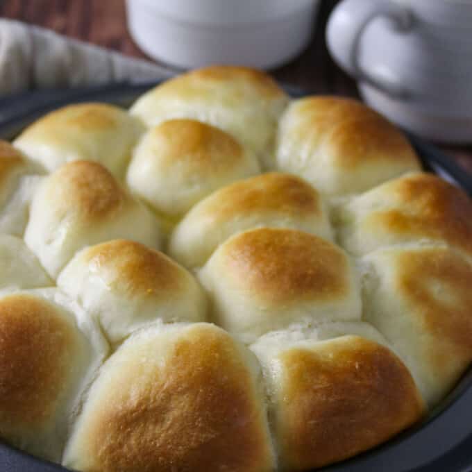 Yema Bread Rolls in a round baking pan