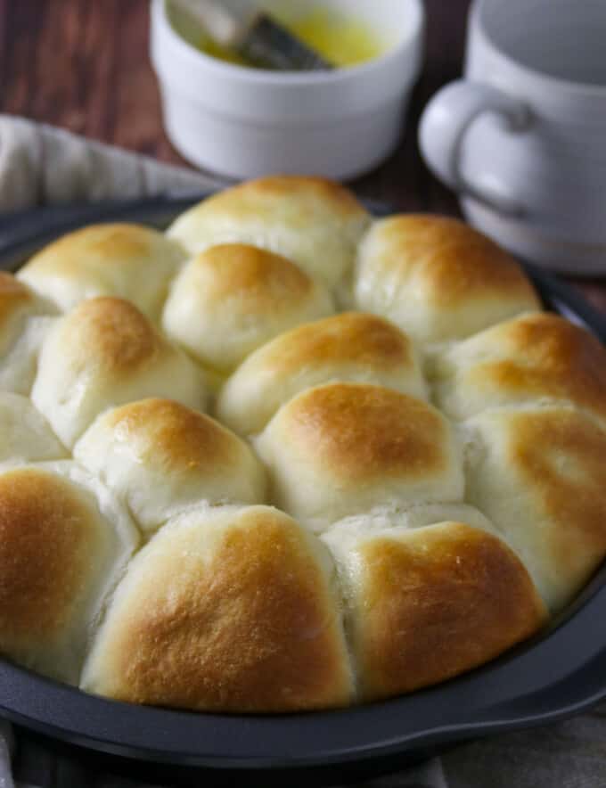 Yema Bread Rolls in a round baking pan