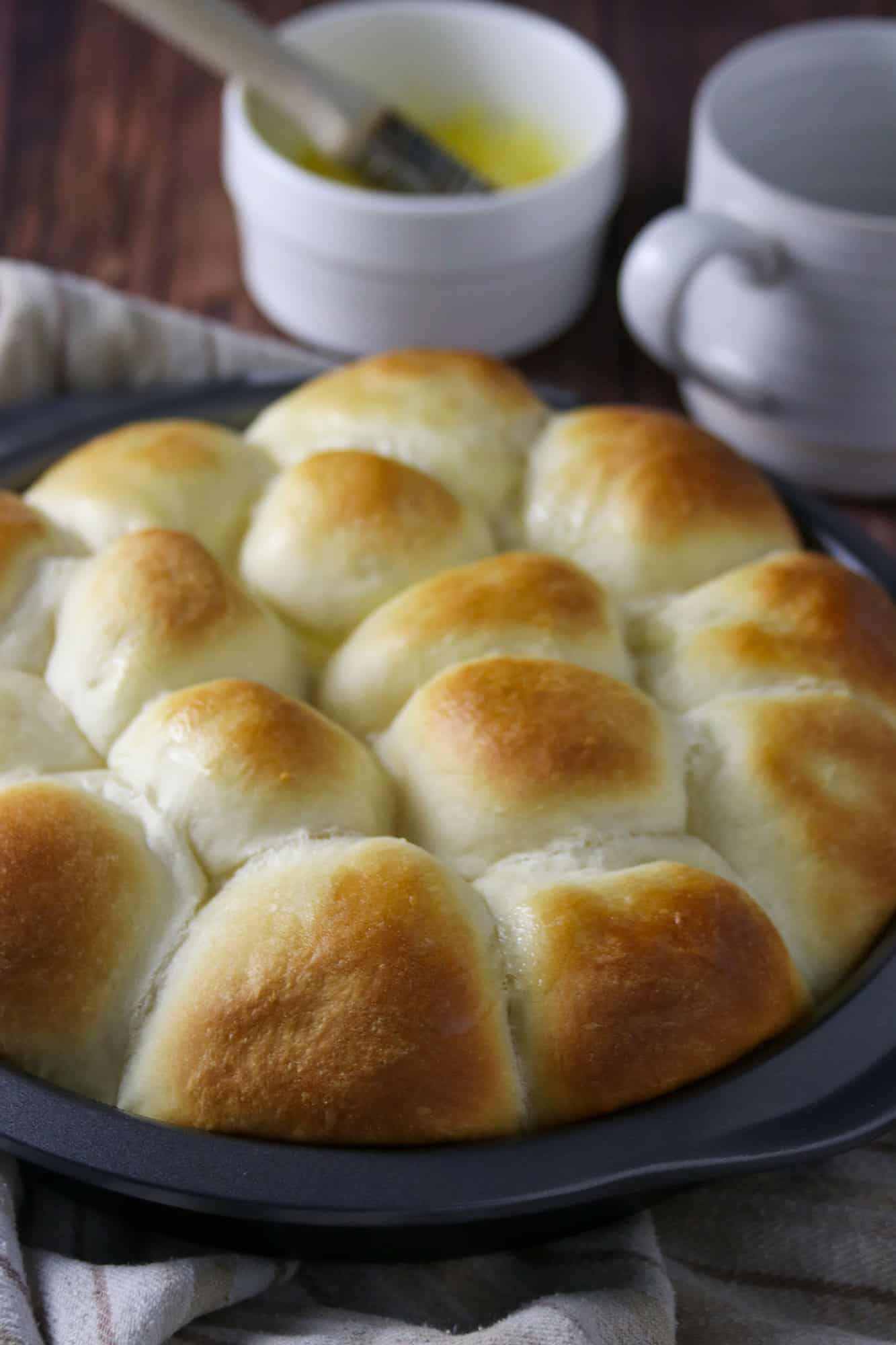 Yema Bread Rolls in a round baking pan