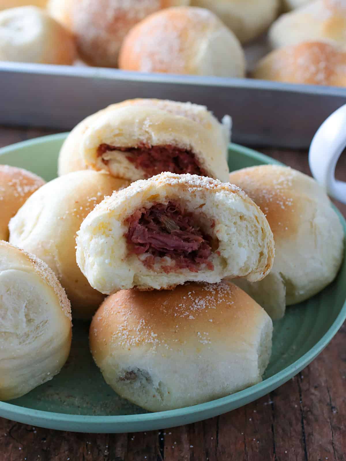 pandesal with corned beef filling on a serving platter