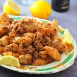 crispy fried squid on a platter