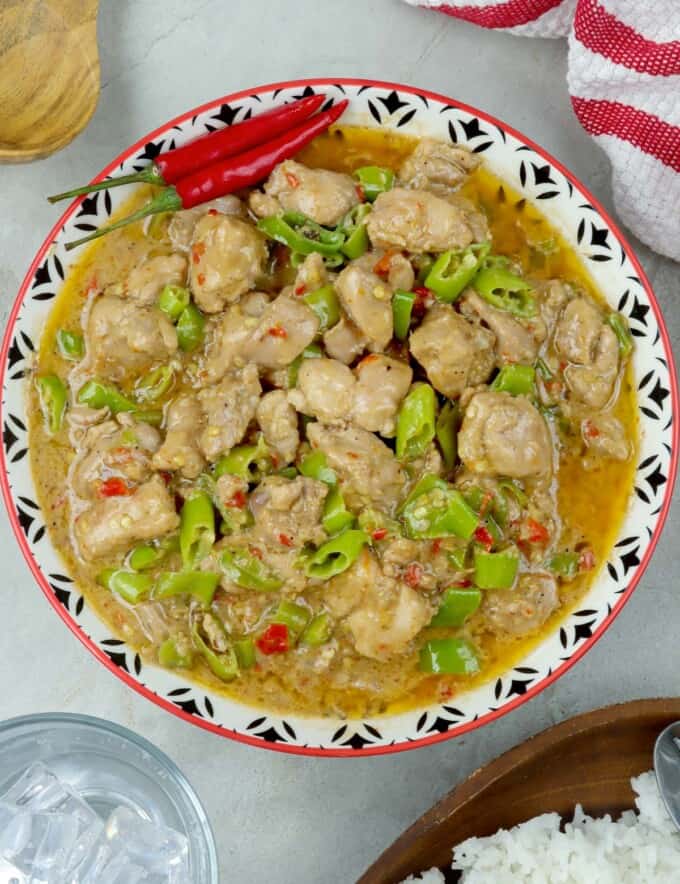 spicy chicken stew with coconut milk in a serving dish