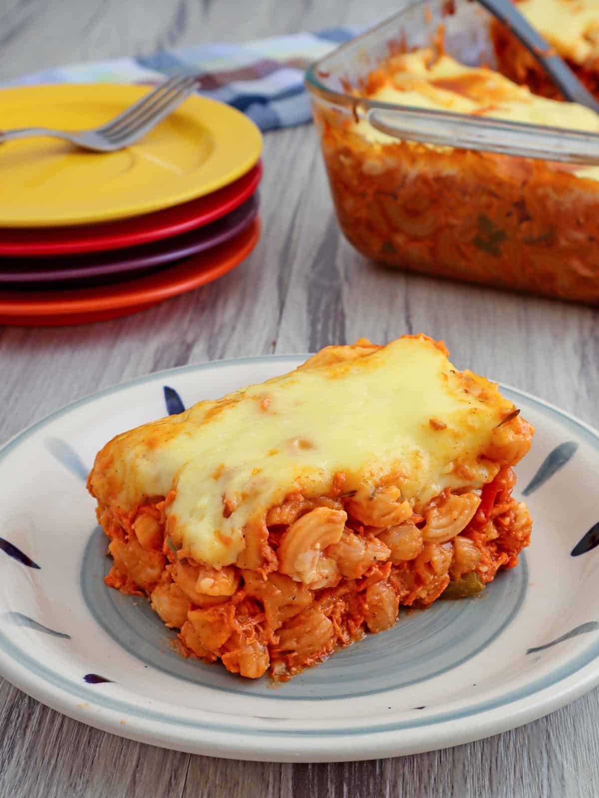 slice of chicken baked macaroni on a serving plate