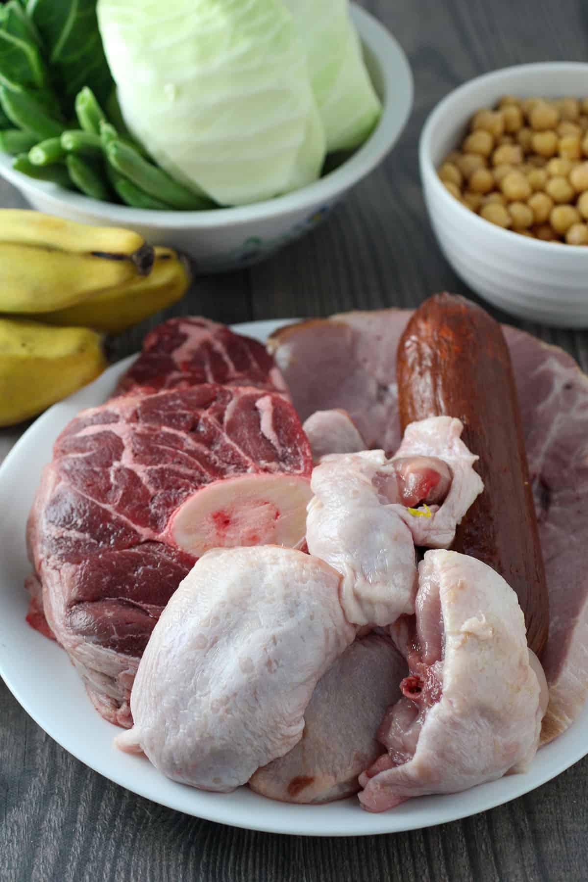 beef shank, sausage, chicken, saba bananas, garbanzo beans, pechay, string beans