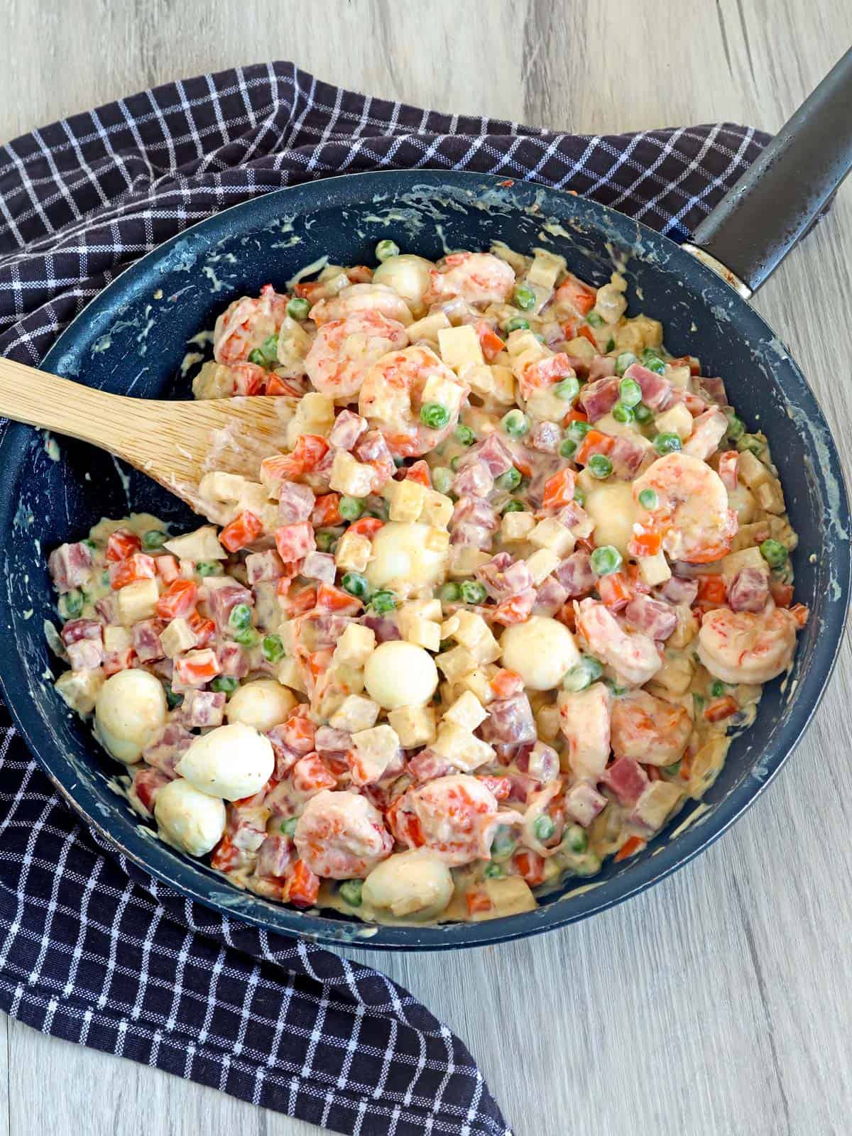 Sipo Egg with Shrimp and Ham in a skillet