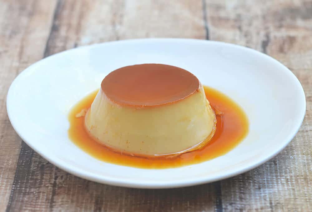 Flan with dulce de leche is rich, creamy and full of caramel flavor. It's a decadent dessert everyone will love!