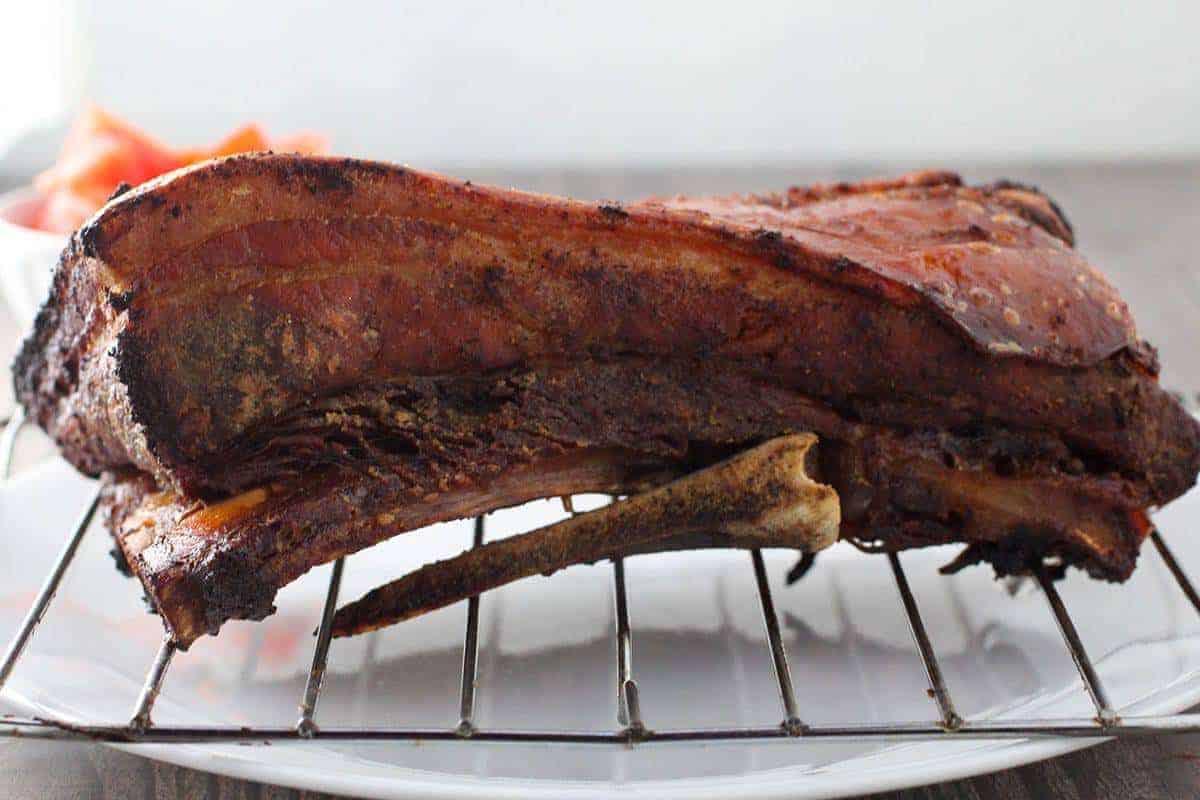 slow cooker lechon on a wire rack