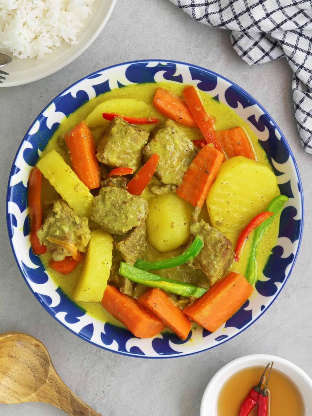 Beef Curry in a blue serving bowl