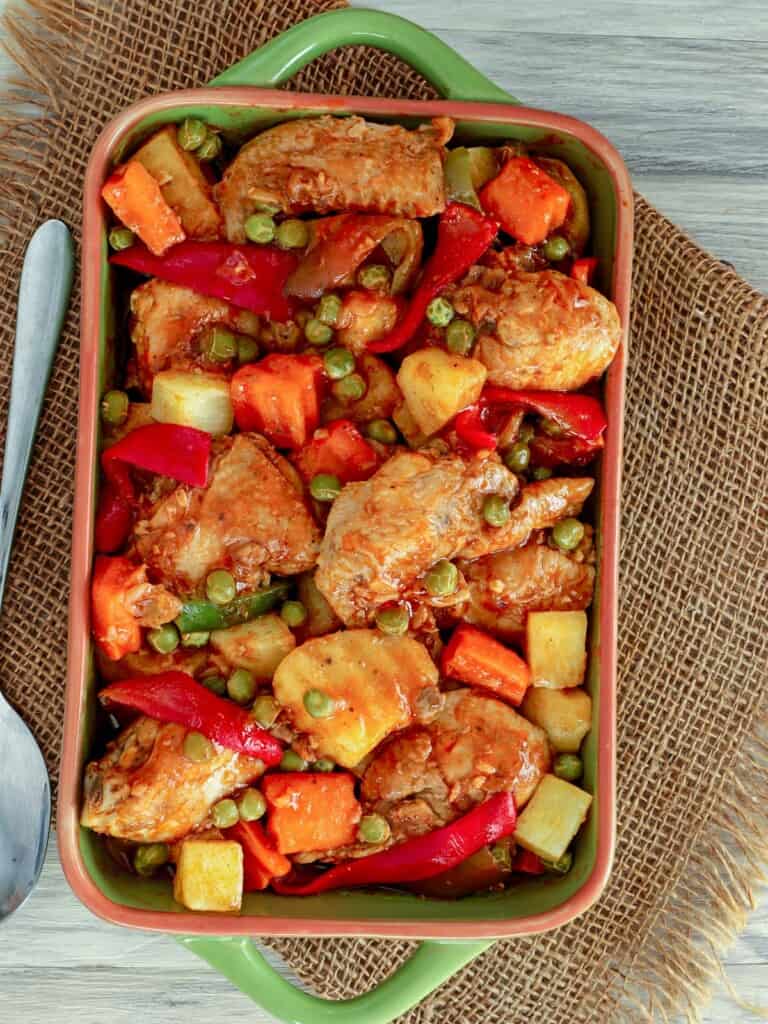 Pineapple Chicken Afritada in a serving dish
