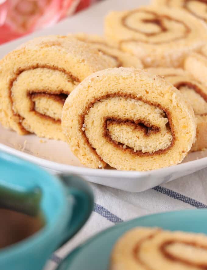 sliced Filipino jelly roll on a white platter