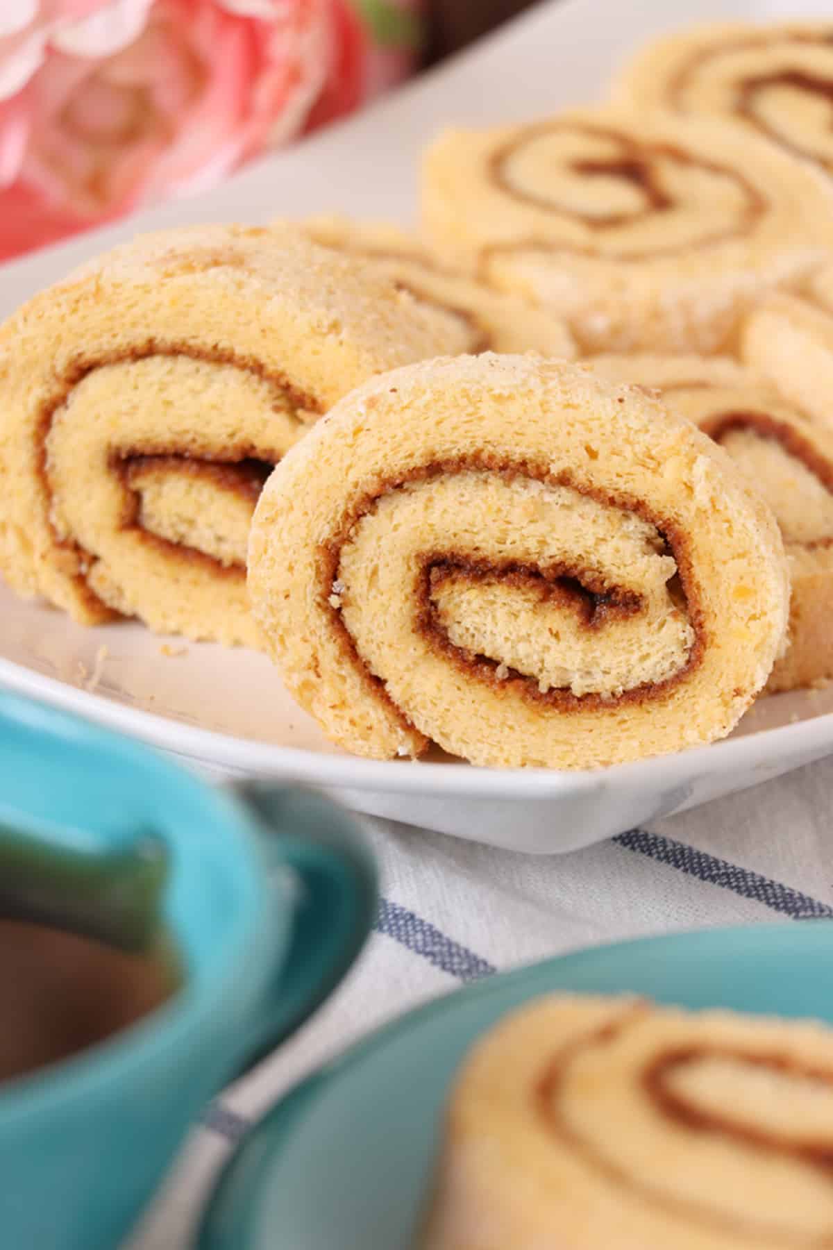 sliced Filipino jelly roll on a white platter
