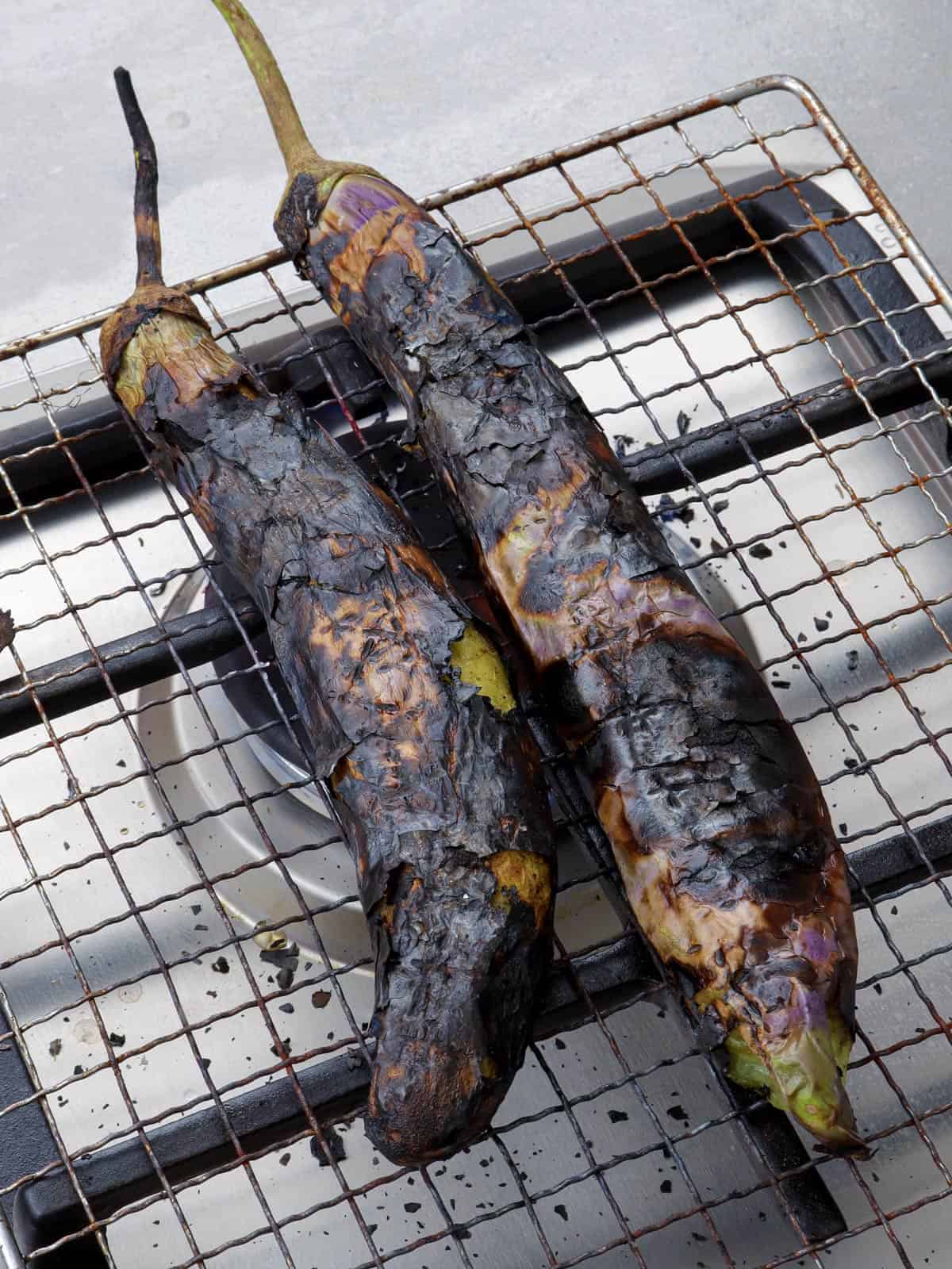 roasted eggplants on a rack