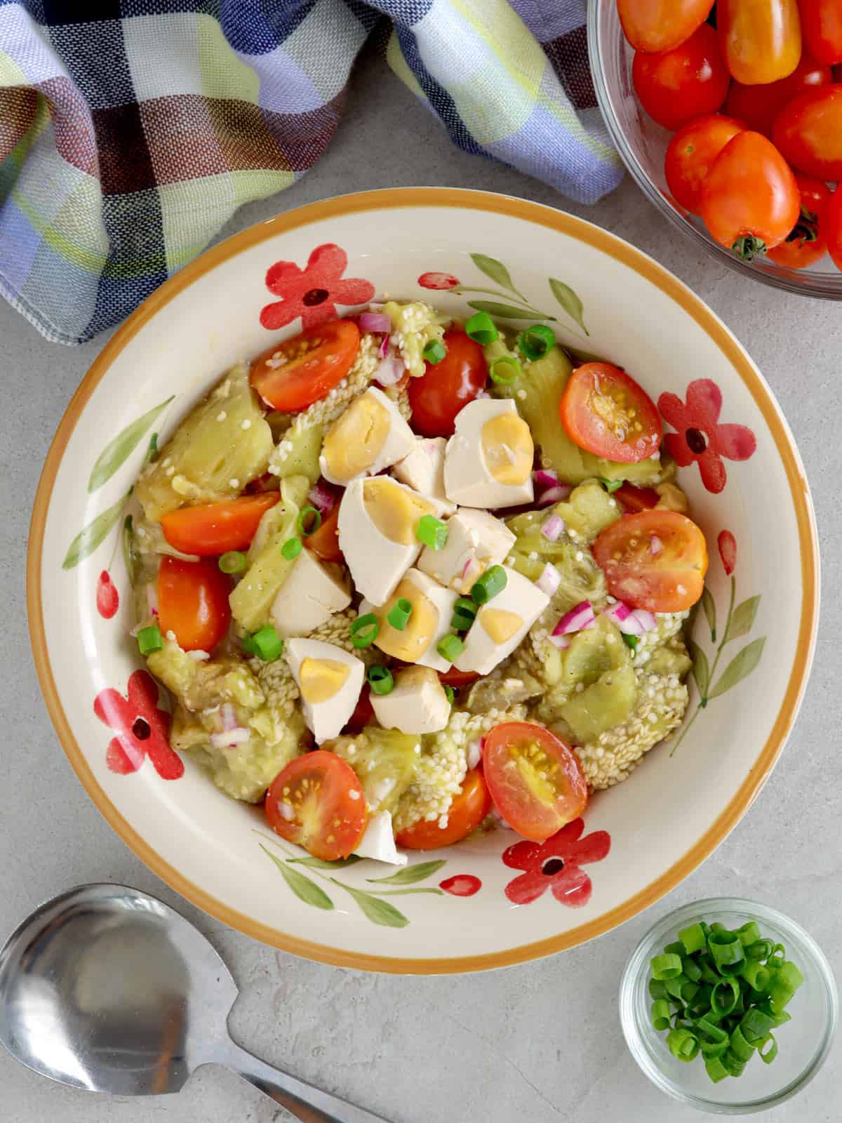 Tomato, Grilled Eggplant and Salted Egg Salad in a serving bowl