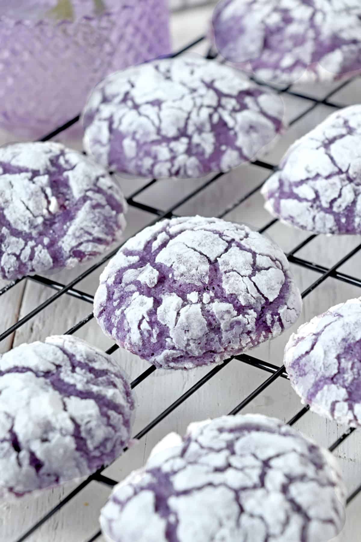 Ube Crinkle Cookies on a wire rack