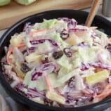 Pineapple Coleslaw in a black serving bowl.