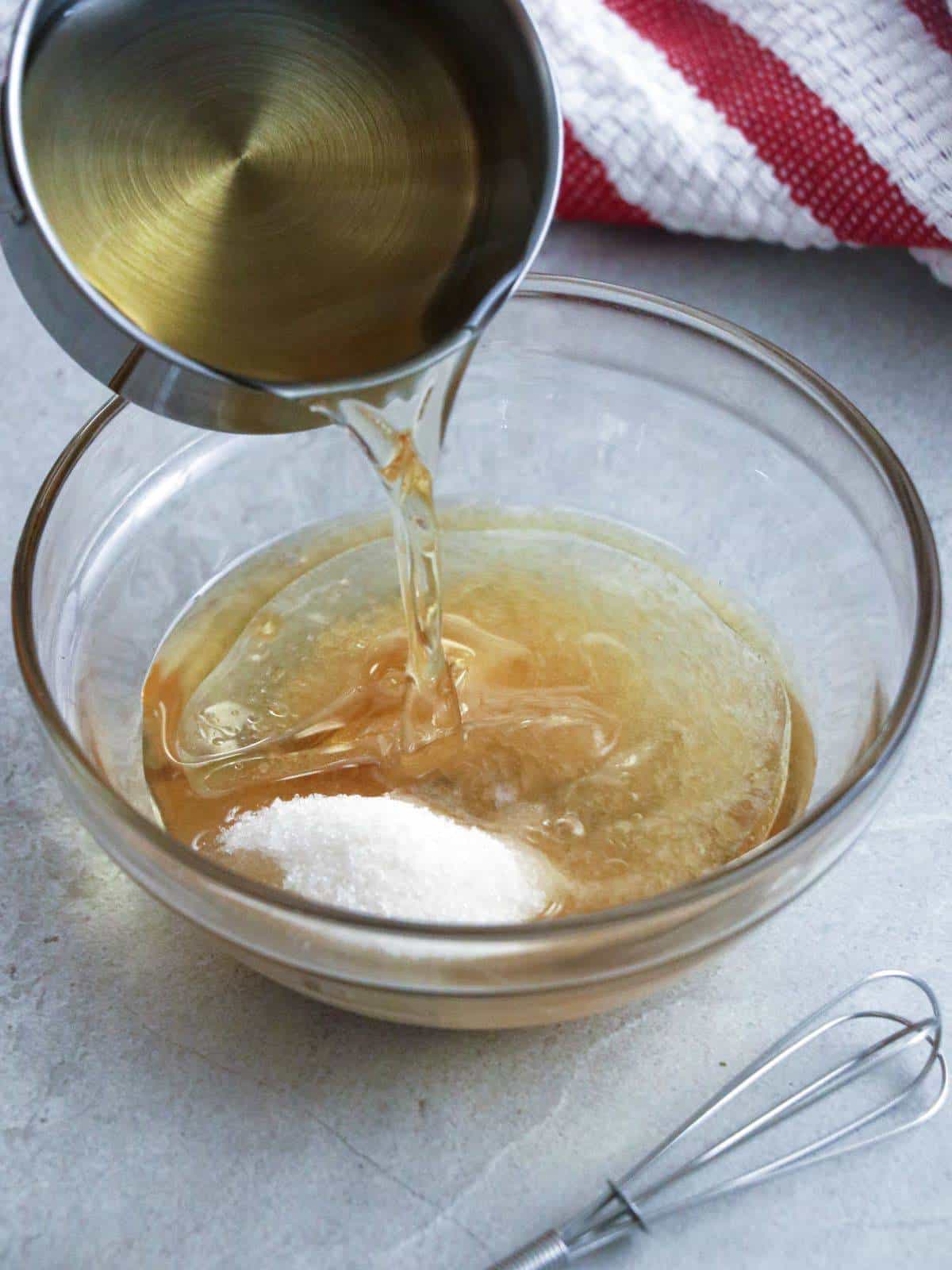 making vinaigrette dressing in a bowl