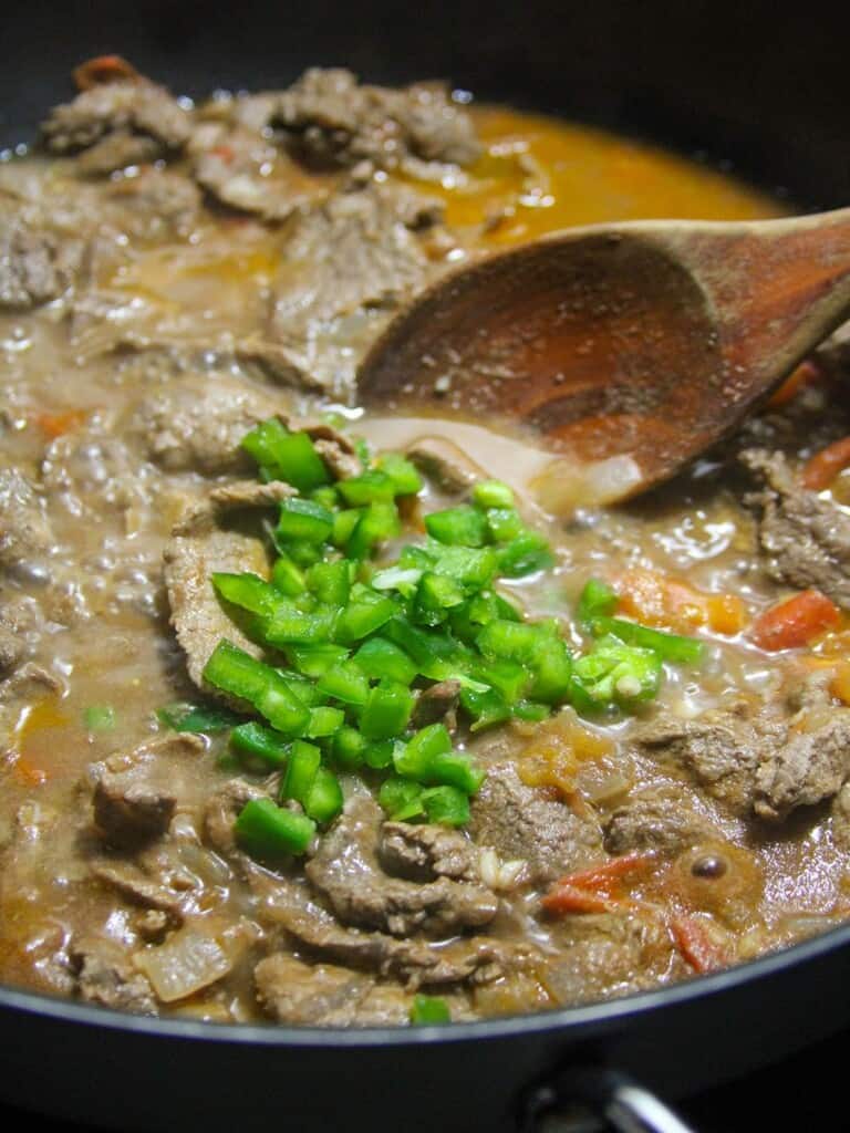 chopped jalapenos added to Mexican style beef stew