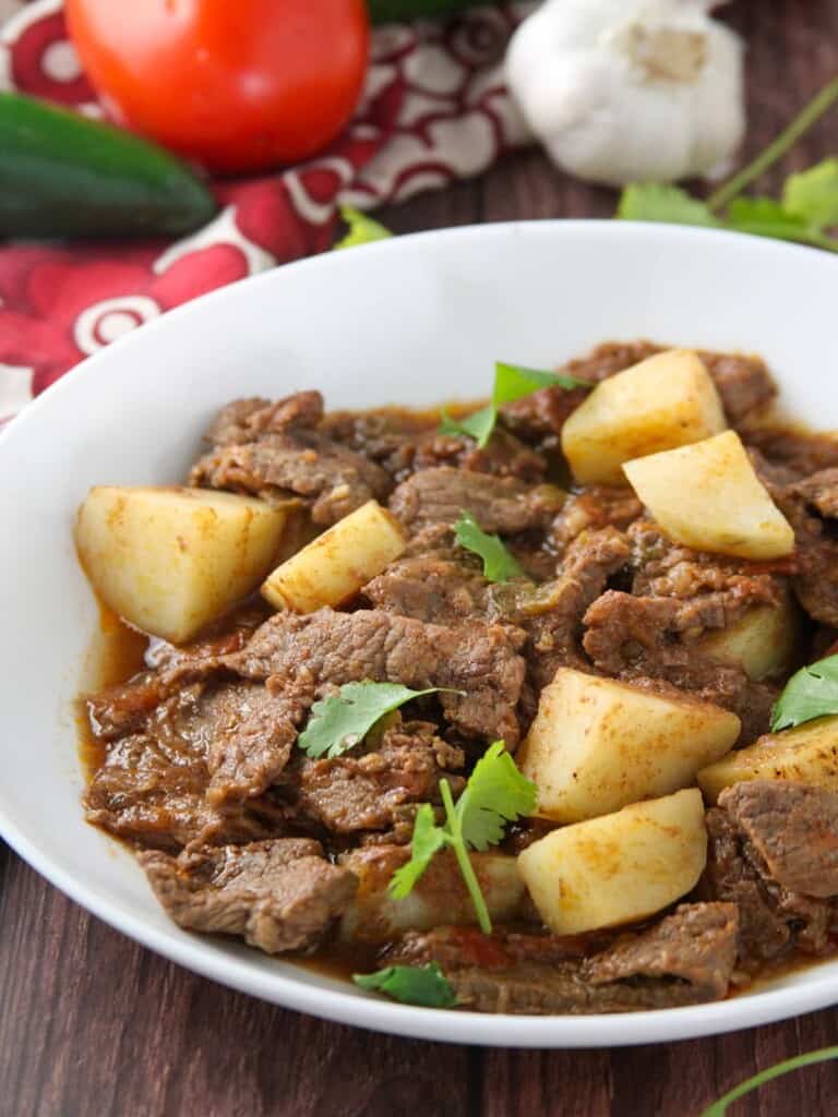 carne guisada in a white serving bowl