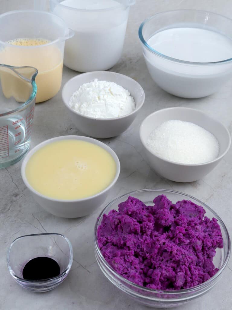 mashed purple yam, condensed milk, coconut milk, cornstarch, sugar in bowls