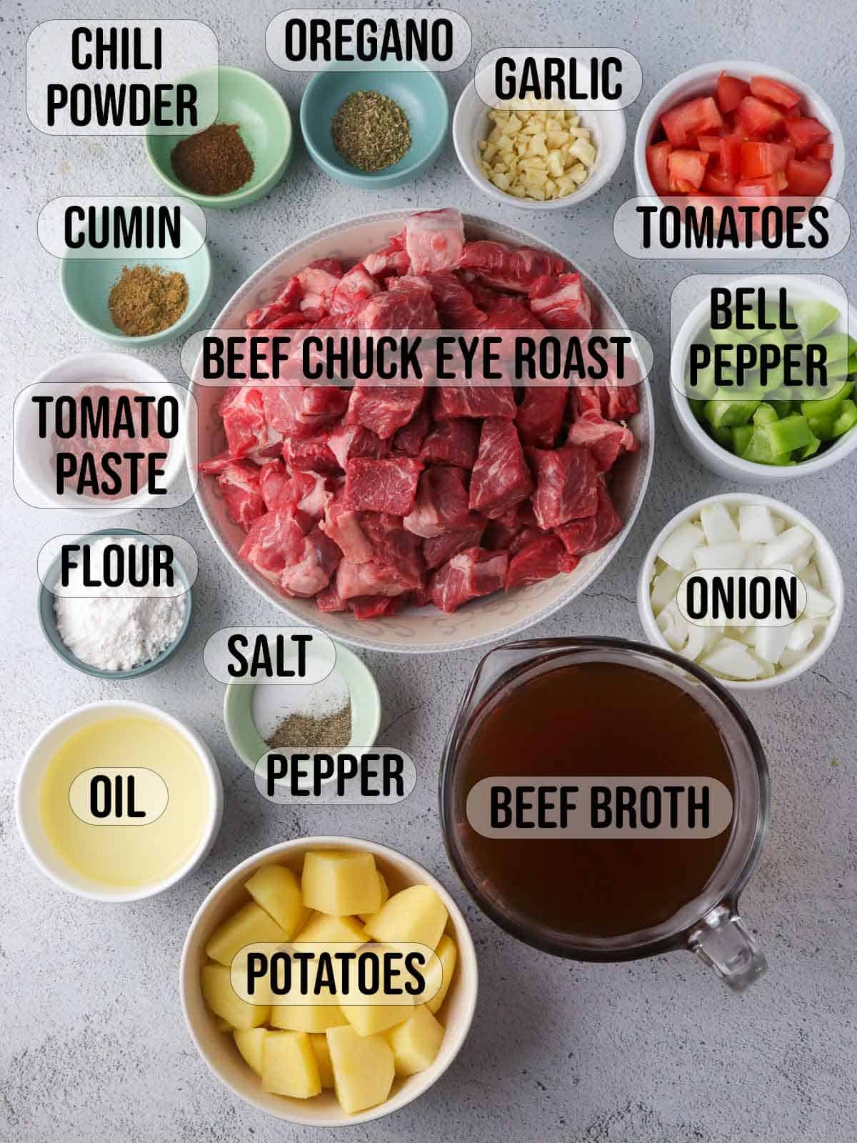 Carne Guisada ingredients in bowls.