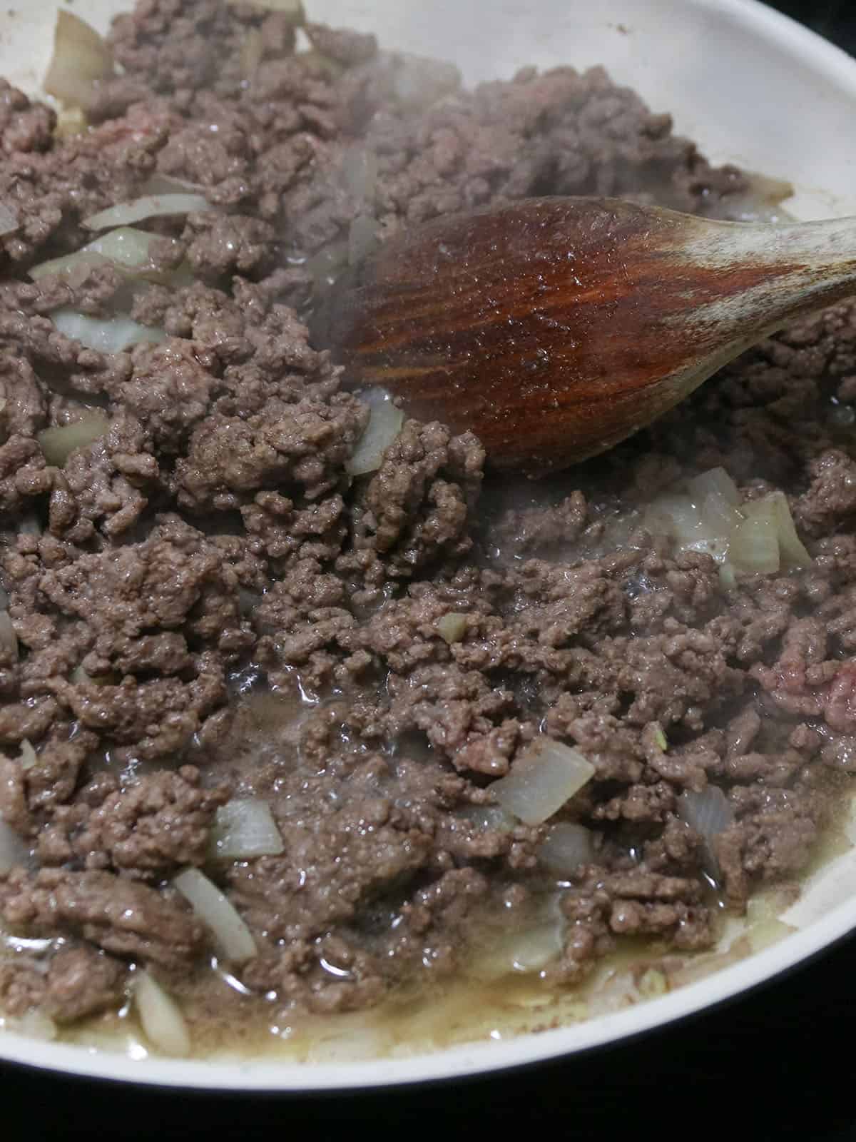 browning ground beef in a pan