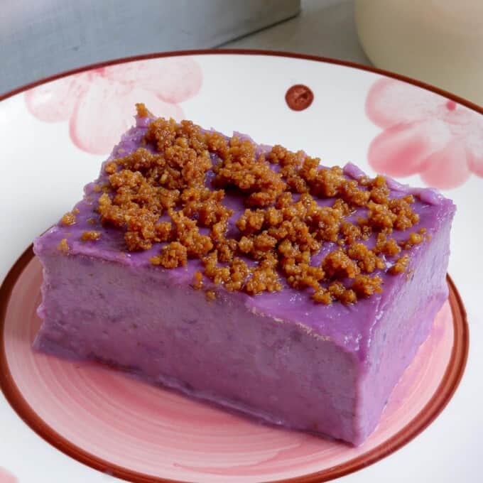 slice of maja de ube on a plate