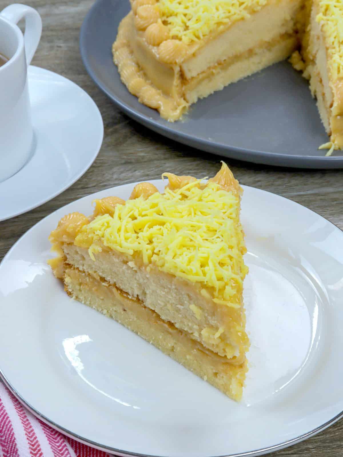slice of yema cake on a serving plate