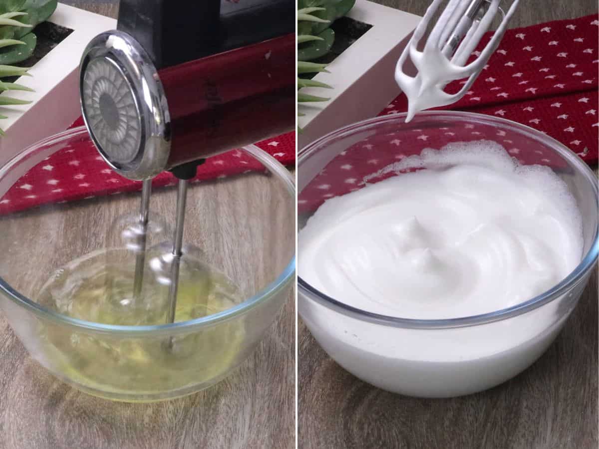 whipping eggs into meringue in a bowl with a red hand mixer.