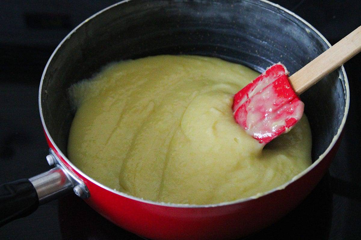 cooking yema spread in a nonstick skillet