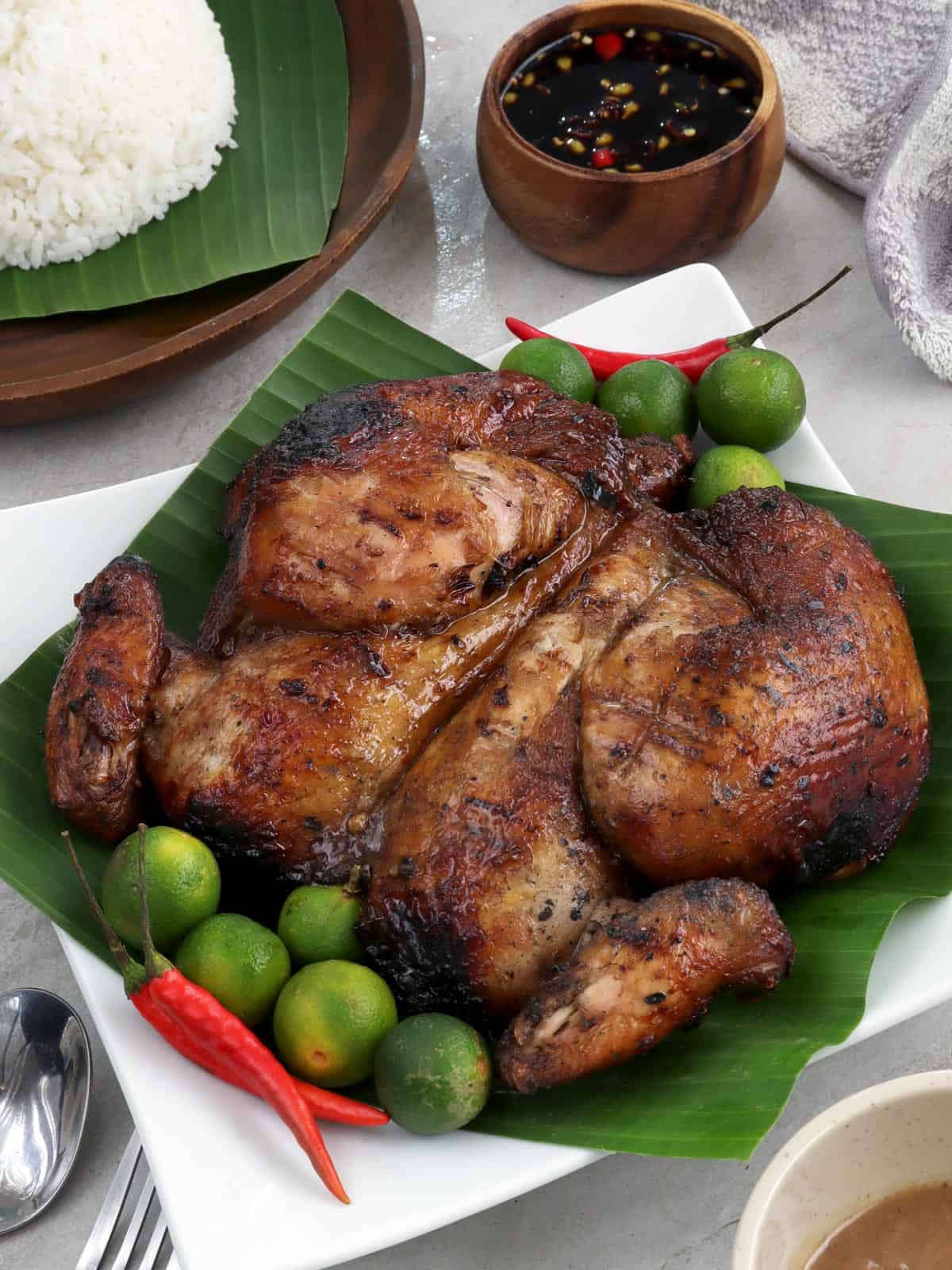 Filipino-style Barbecue Chicken on a banana leaf-lined plate