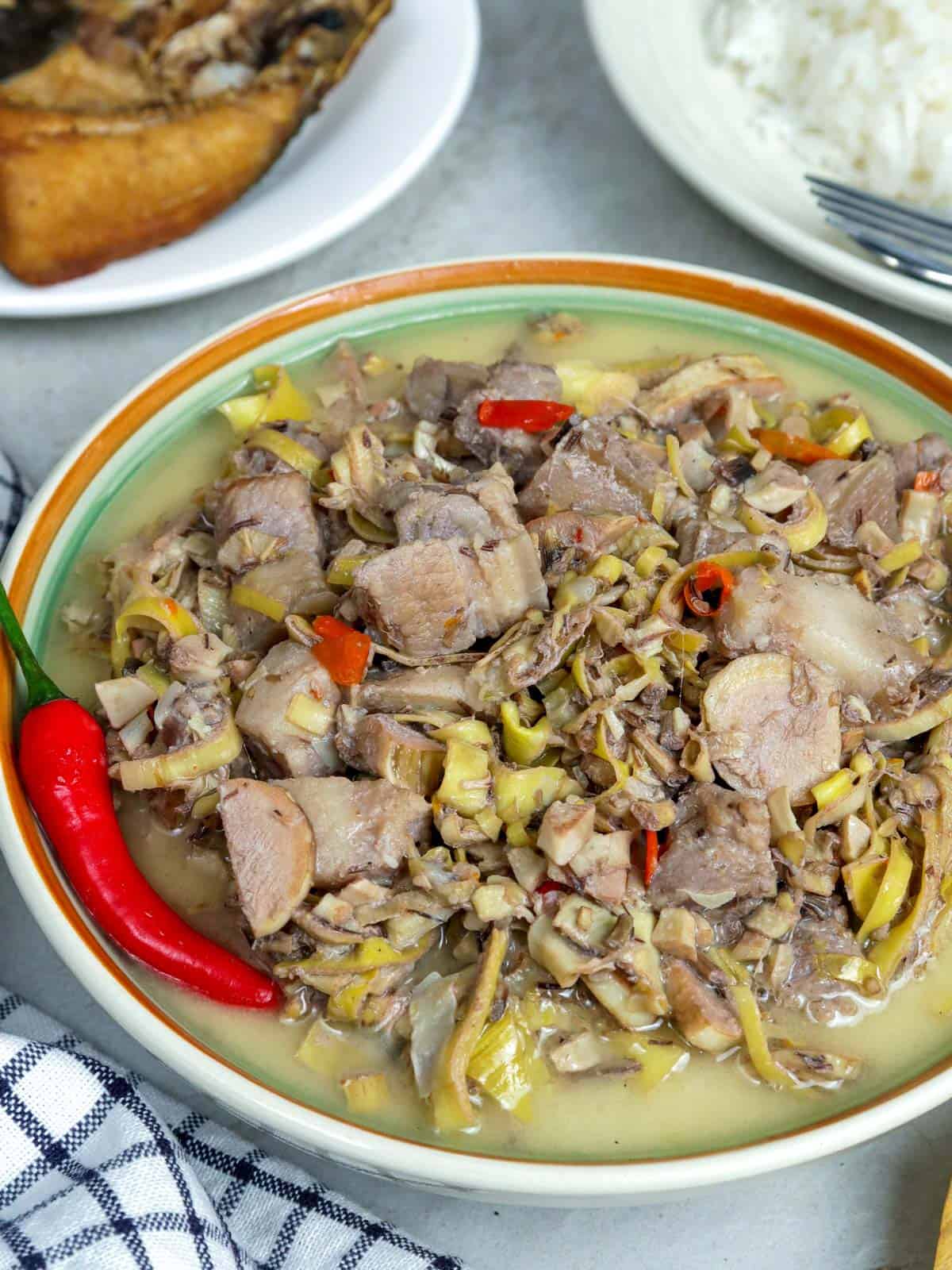 Ginataang Puso ng Saging in a serving bowl