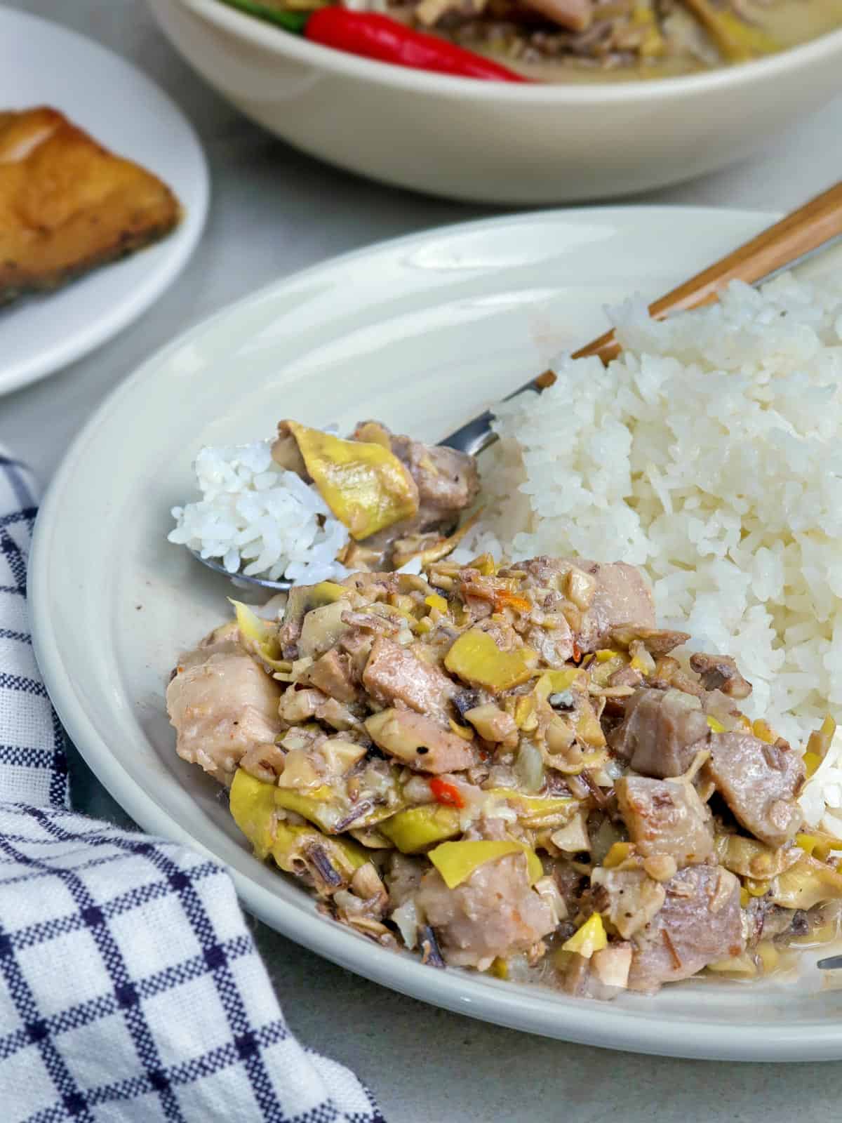 ginataang banana heart on a plate with steamed rice