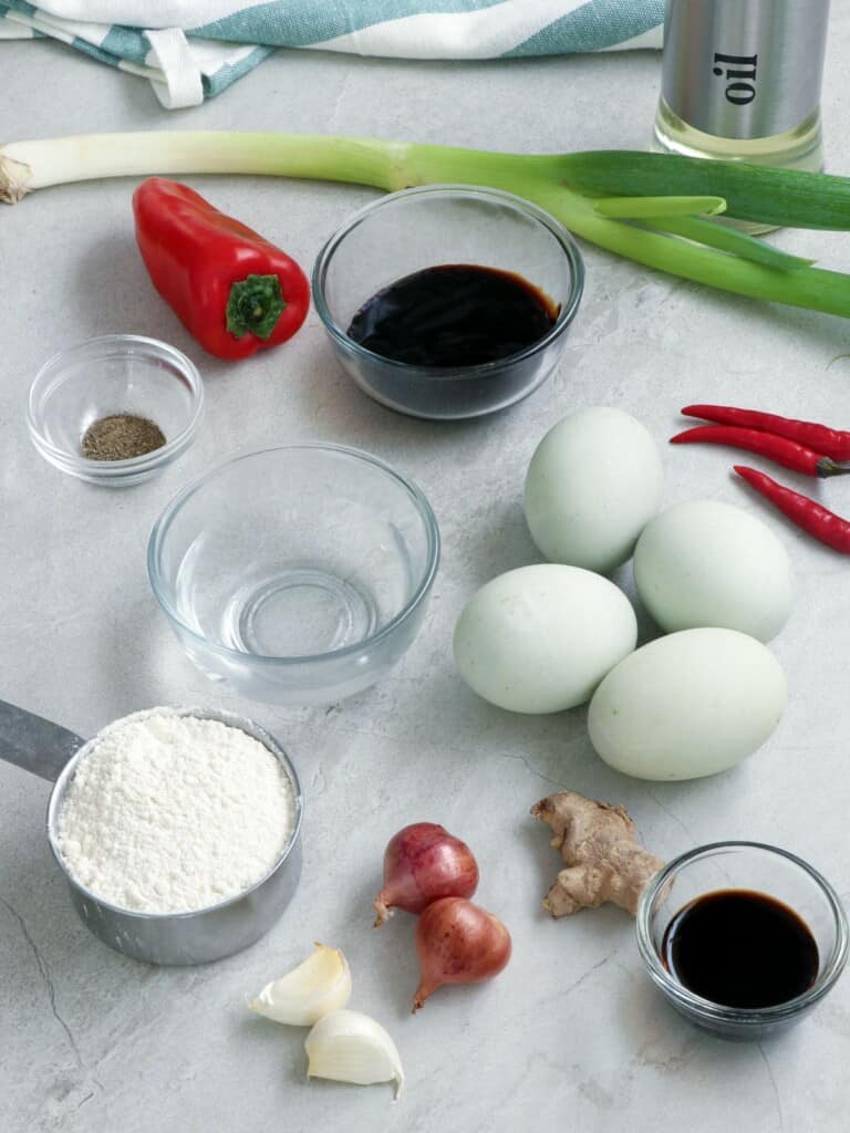 balut, flour, chili peppers, bell pepper, onions, garlic, ginger, oyster sauce, green onions