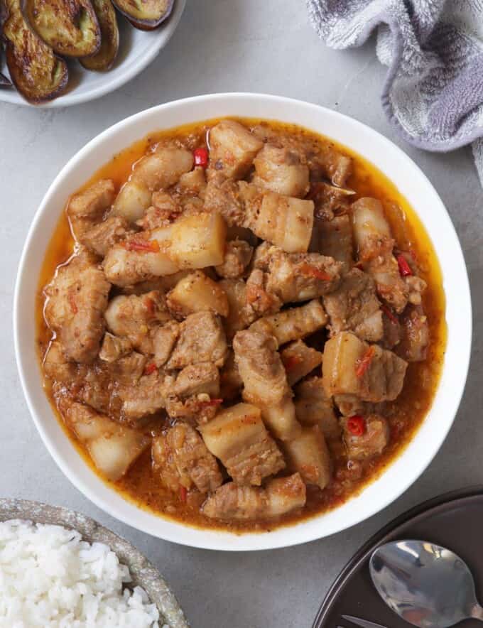 pork binagoongan in a white bowl