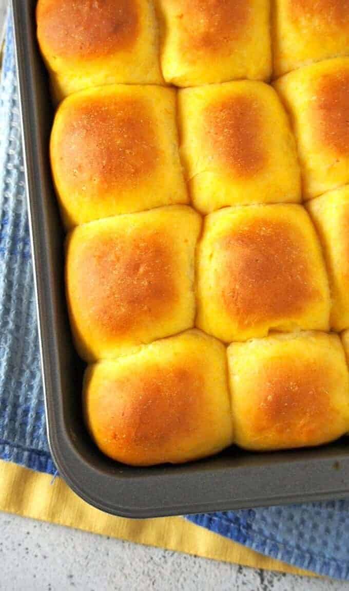 sweet potato bread rolls on a baking sheet