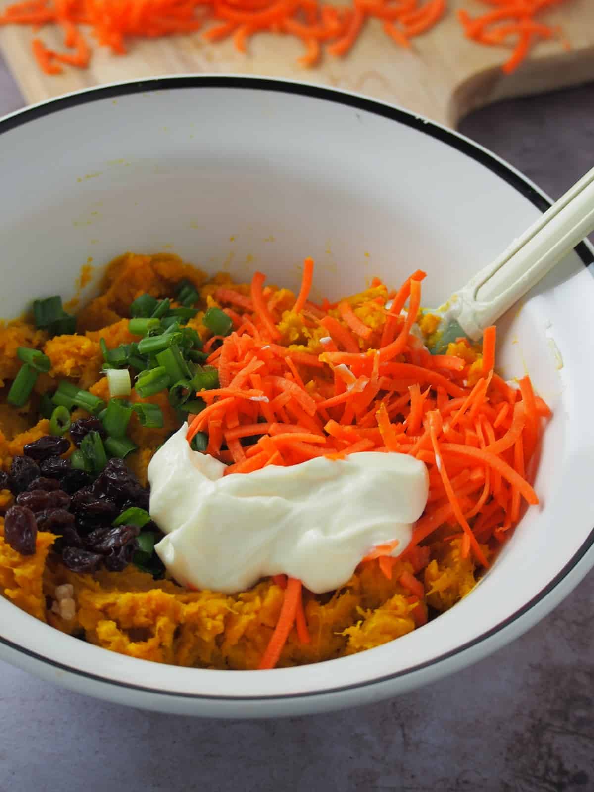 making kabocha salad in a bowl