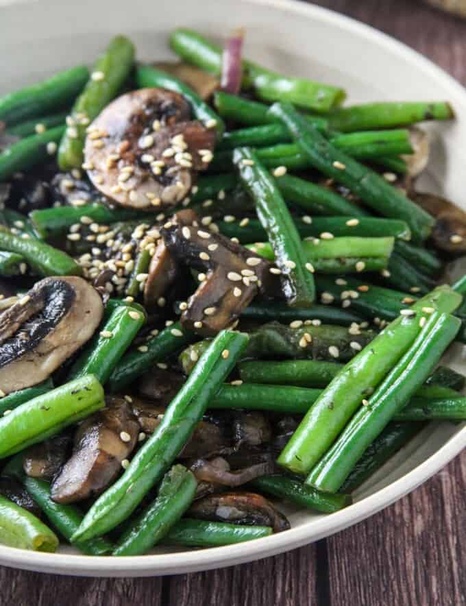 green beans stir-fry with mushrooms in a bowl