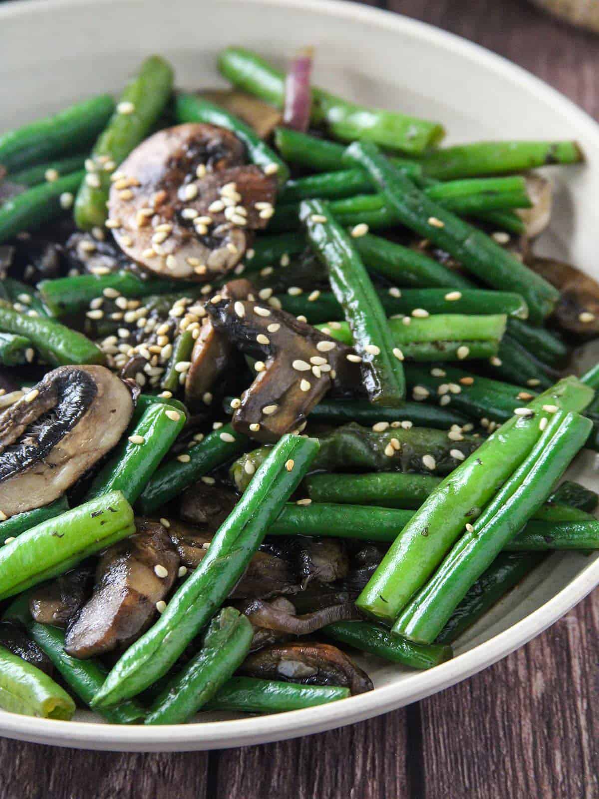 green beans stir-fry with mushrooms in a bowl