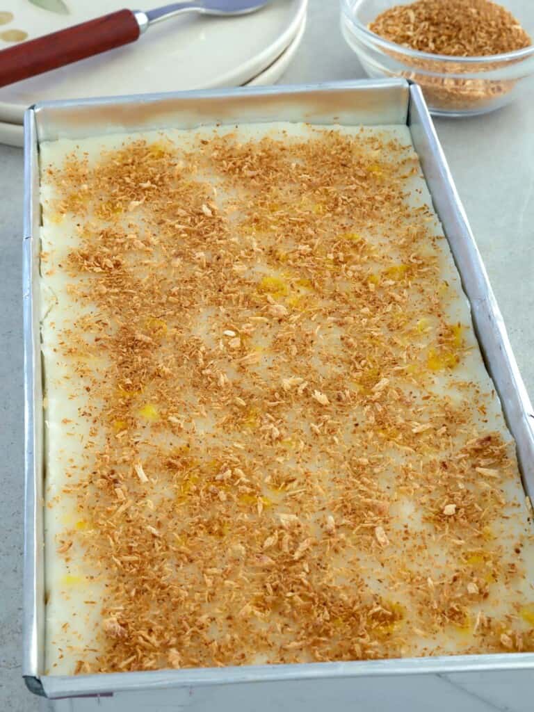 Maja Blanca with toasted coconut topping in a rectangular pan