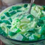 serving buko pandan from a clear bowl
