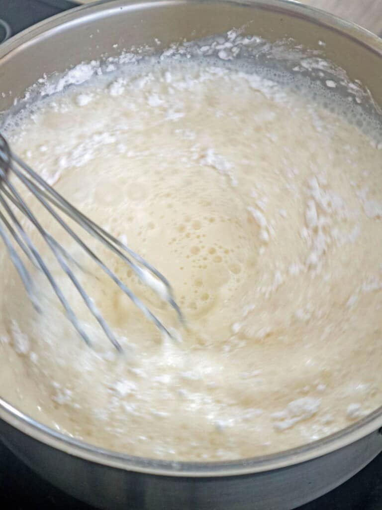 cooking milk pudding in a pan
