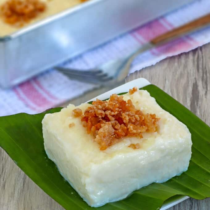 slice of Tibok-Tibok on a banana leaf-llined serving plate