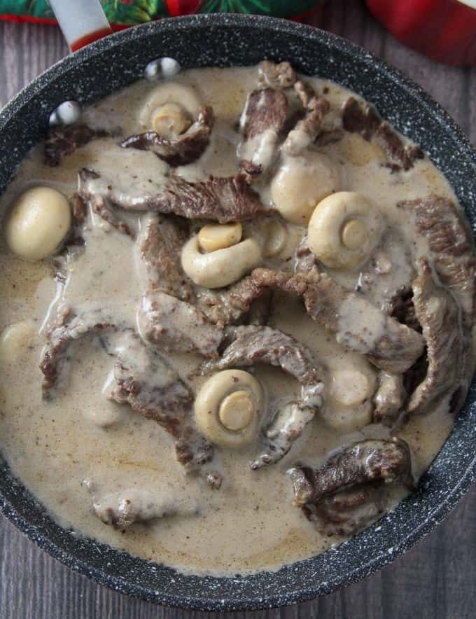 creamy beef and mushrooms in a skillet