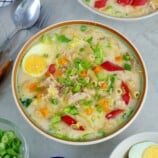 Chicken Sopas with eggs and hot dogs in a serving bowl
