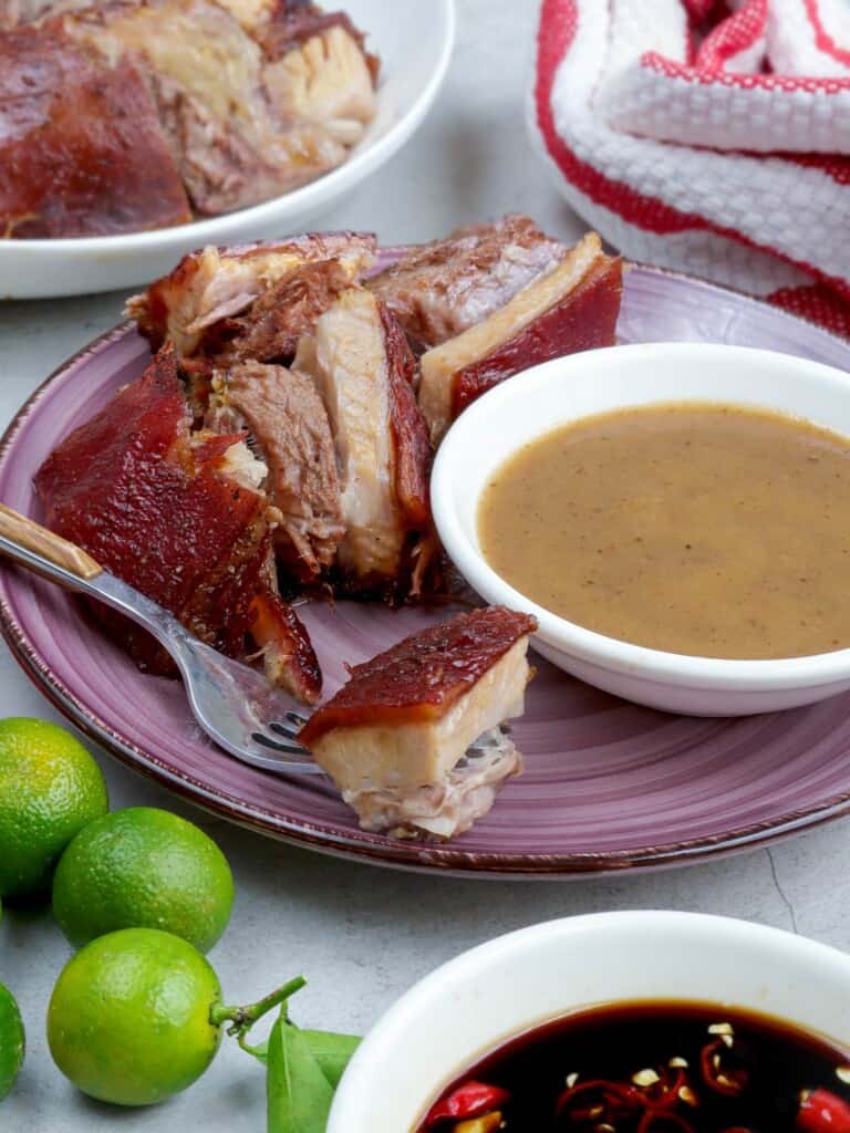 chopped roasted pig head on a serving platter